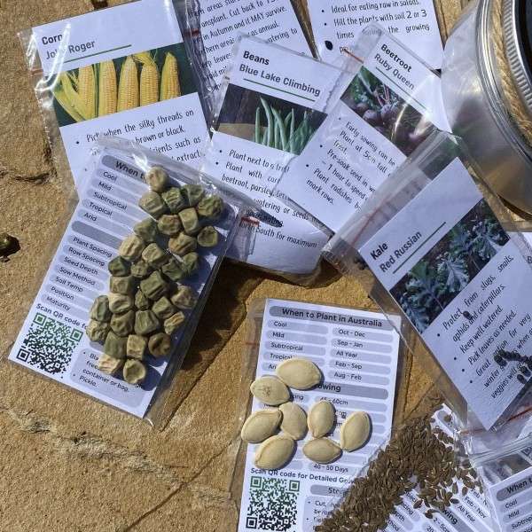 Survival Seed Tin containing a complete collection of heirloom seed packets