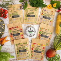 Survival Starter Bundle with Australian heirloom non-GMO seeds, planting instructions, and regional planting calendar, surrounded by fresh produce.