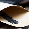 black seeds in envelope